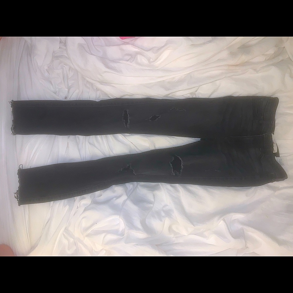 Black, ripped, hollister, skinny jeans. Perfect condition.